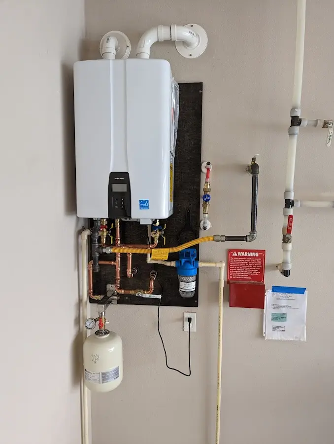 Professional plumber installing copper piping in a Desert View Highlands home